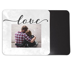 Calamita quadrata con scritta in nero