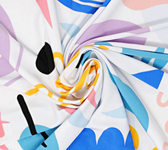 Tessuto Jersey stampato con motivo geometrico colorato