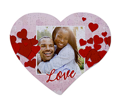 Cuori rossi su puzzle cuore A3