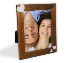 cornice in legno cuori bianchi