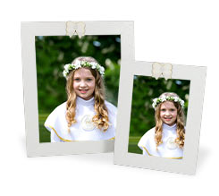 Cornice con decoro fiocco in legno e foto prima comunione