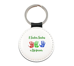 portachiavi rotondo in pelle impronte