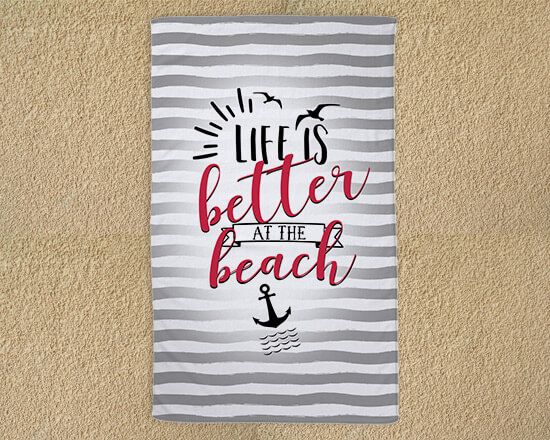 Telo mare con scritte e decorazioni