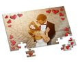 Cuori rossi su puzzle A4