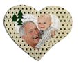 Puzzle a forma di cuore con alberi verdi