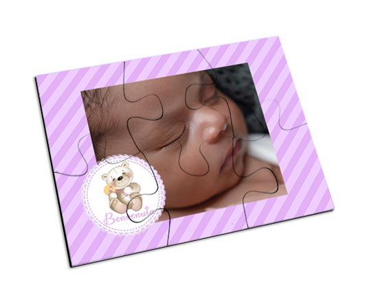 Orsetto rosa su puzzle magnetico