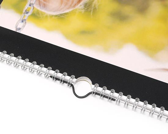 13 pagine personalizzate rilegate da una comoda spirale
