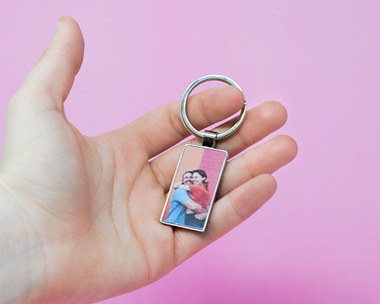 Portachiavi fronte retro in metallo con immagine di coppia