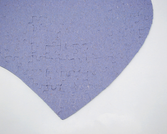 Retro in cartoncino del puzzle a forma di cuore formato A4