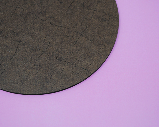 Puzzle rotondo in legno retro