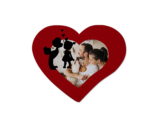 Grafica con bambini su puzzle a cuore