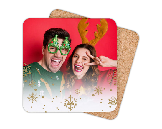 Stelle di neve oro e palline per il sottobicchiere