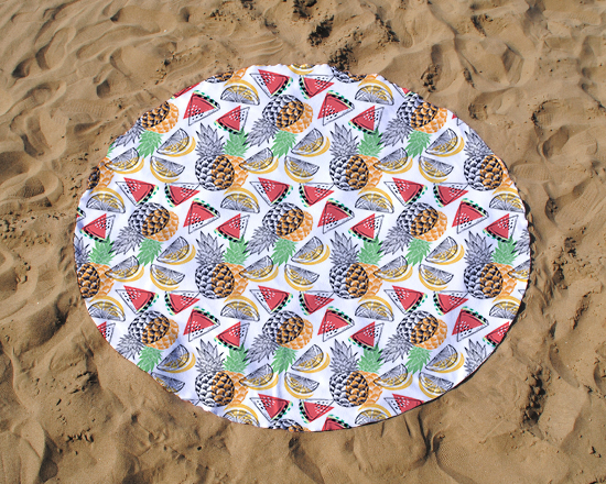 telo mare rotondo con grafica con ananas e meloni