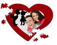 Grafica con bambini su puzzle a cuore