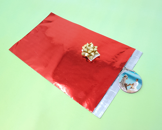 portachiavi rotondo personalizzato con confezione regalo