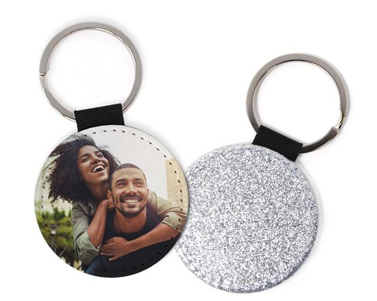 Portachiavi in pelle rotondo con retro glitter