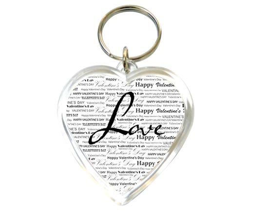 Il tuo portachiavi a forma di cuore con scritte nere