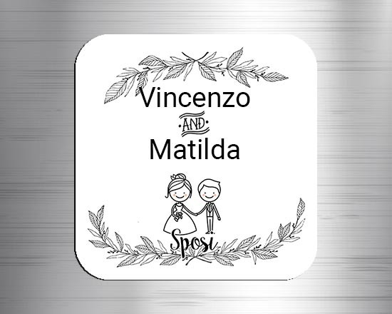 Calamita quadrata con sposi e decorazione