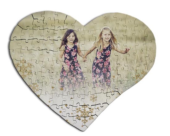 Il puzzle con foto in legno dalla forma a cuore