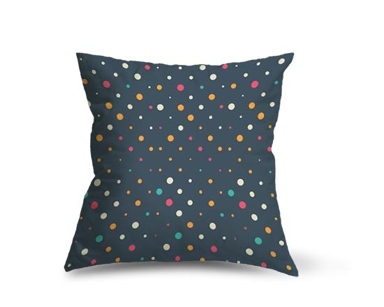 Cuscino dallo sfondo blu con pois colorati