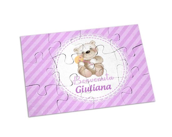 Orsetto rosa su puzzle magnetico