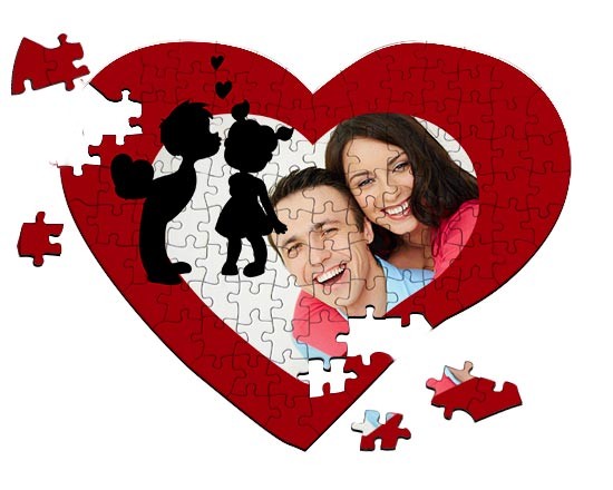 Grafica con bambini su puzzle a cuore